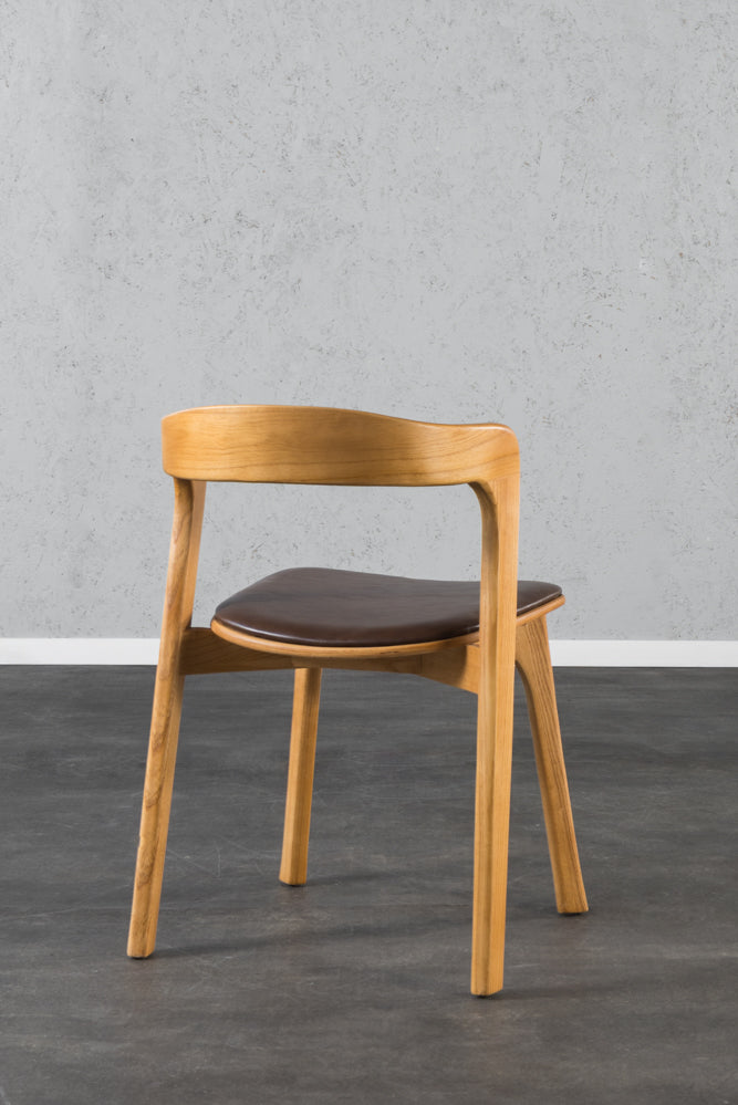 כיסא ירח גוון אחיד דמוי עור כהה